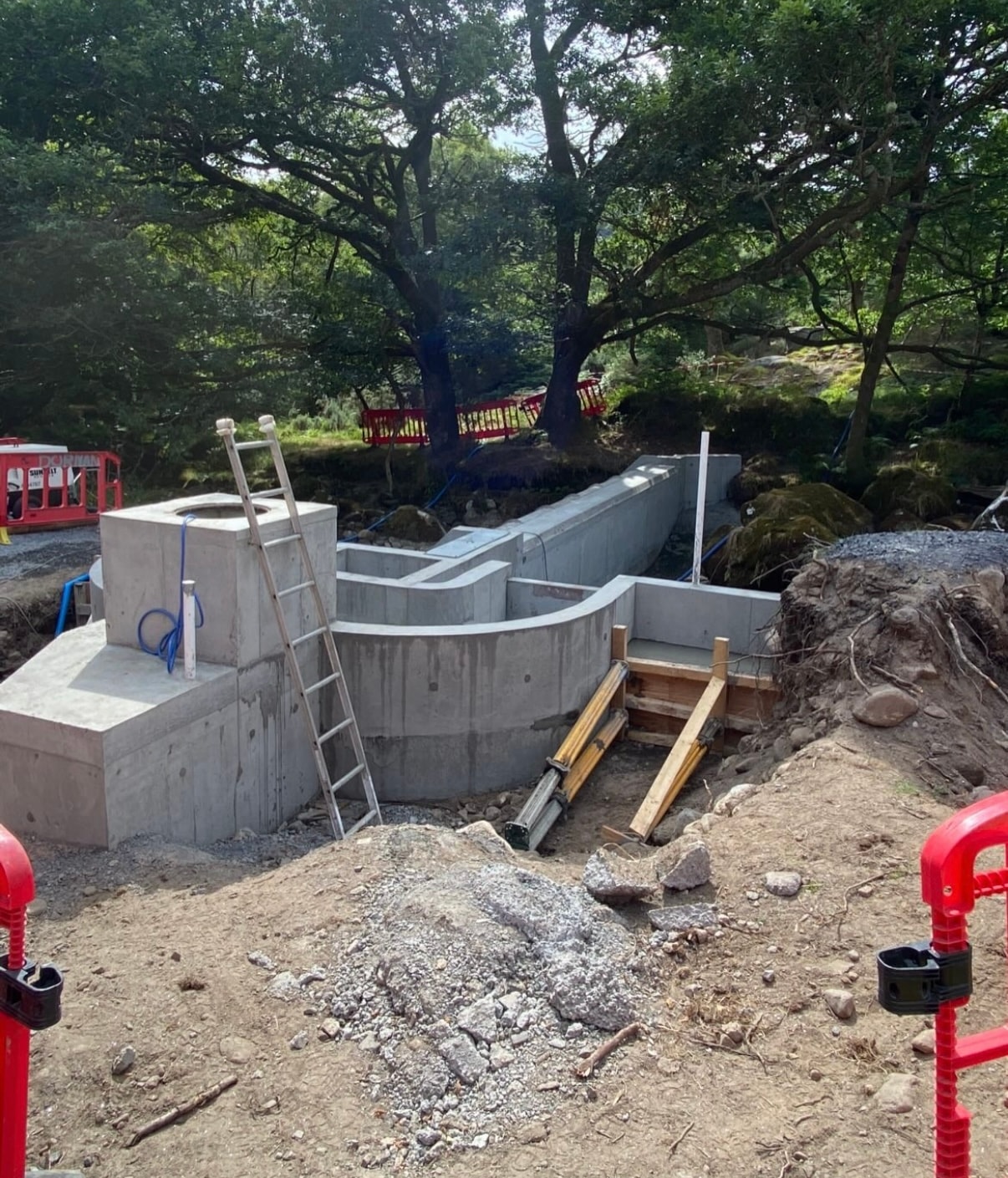 Completed weir structure viewed from elevated angle